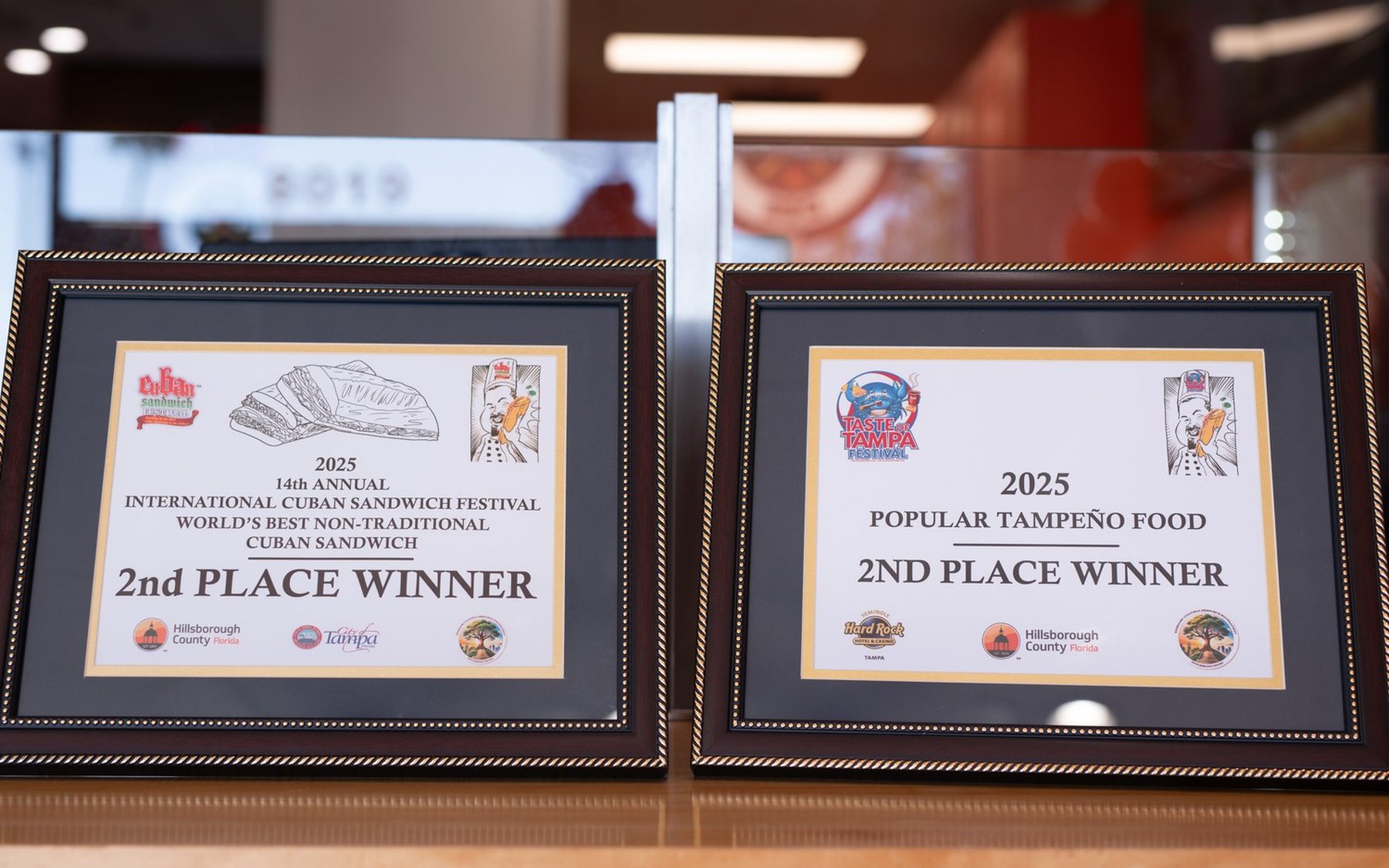 Southern Luv BBQ’s two 2025 second-place awards from the International Cuban Sandwich Festival and the Taste of Tampa Festival